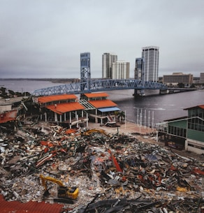 aerial photography of yellow excavator claw in metal strap shop