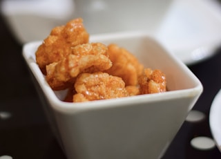 close-up photo of nuggets in white ceramic bowl