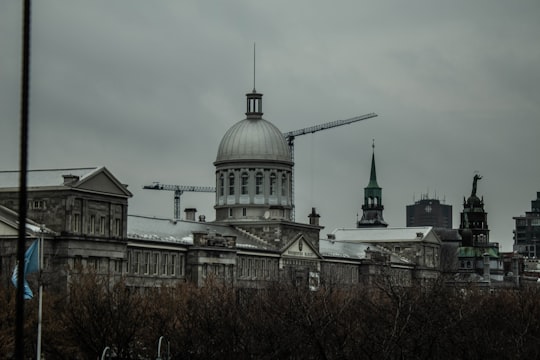 view photography of gray dome building in Bonsecours Market Canada