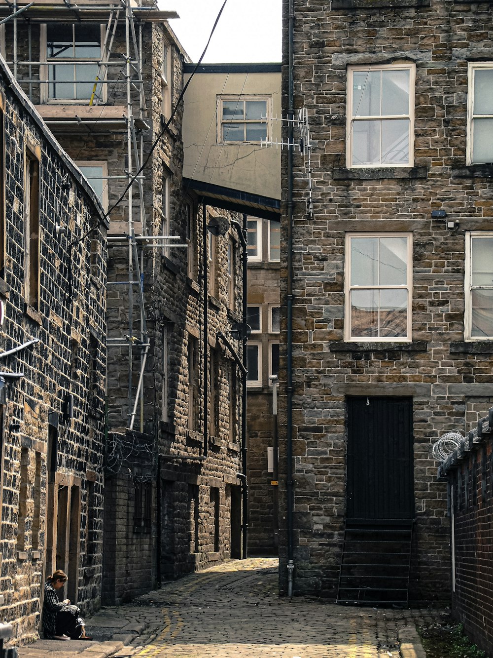 view photography of concrete brick houses