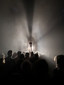 A spotlight illuminating a talented performer captivating the audience.