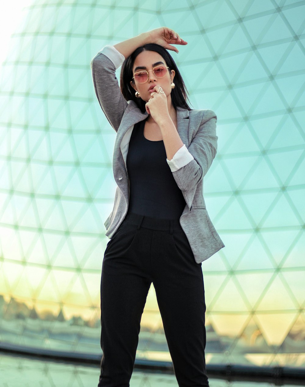 women's gray blazer and black shirt with matching black pants