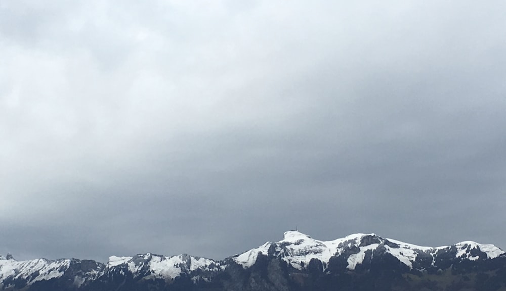 mountain covered by snow