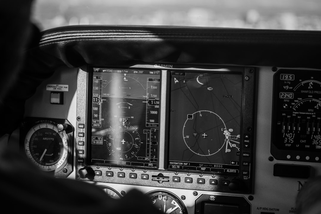 grayscale photo of control panel