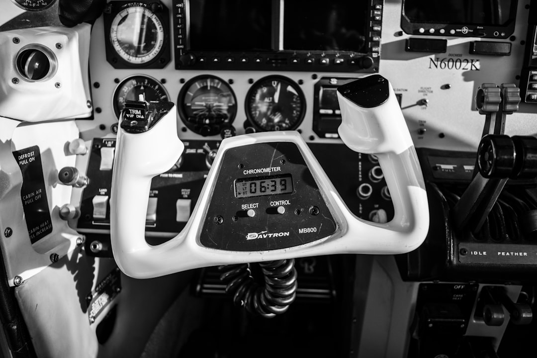 grayscale photo of aircraft controller