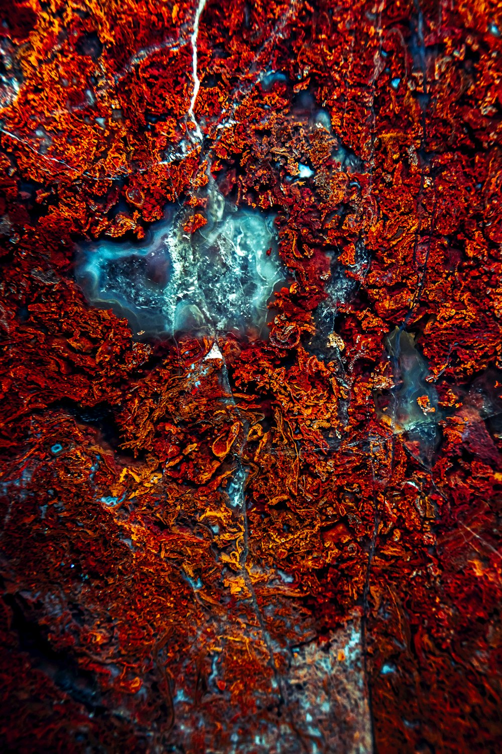 a close up of a red and blue substance