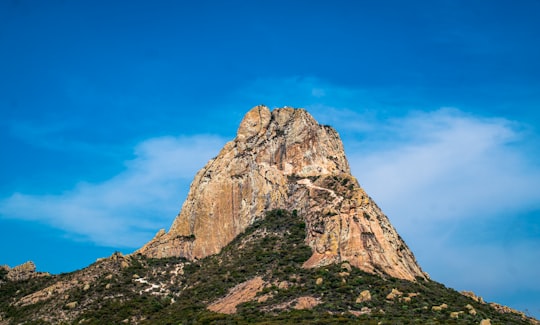 green and brown mountain in Peña de Bernal Mexico