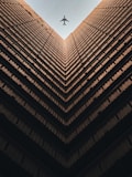 worm view photo of brown building during daytime