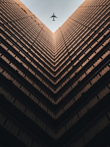 worm view photo of brown building during daytime