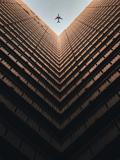 worm view photo of brown building during daytime