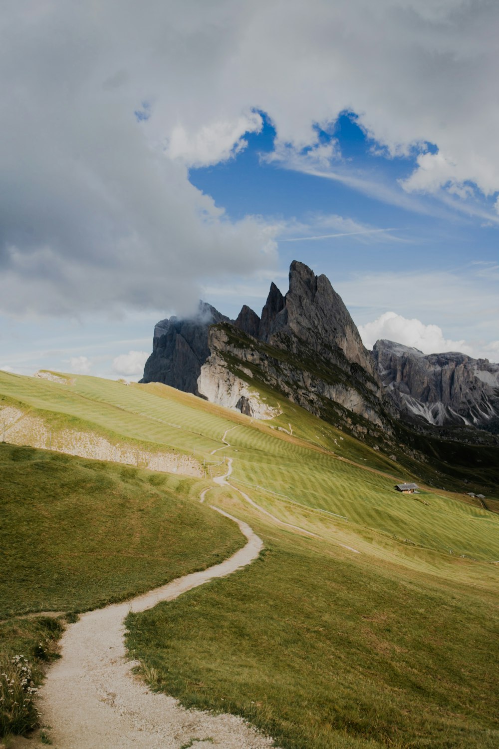 gray mountains under cloudy sky