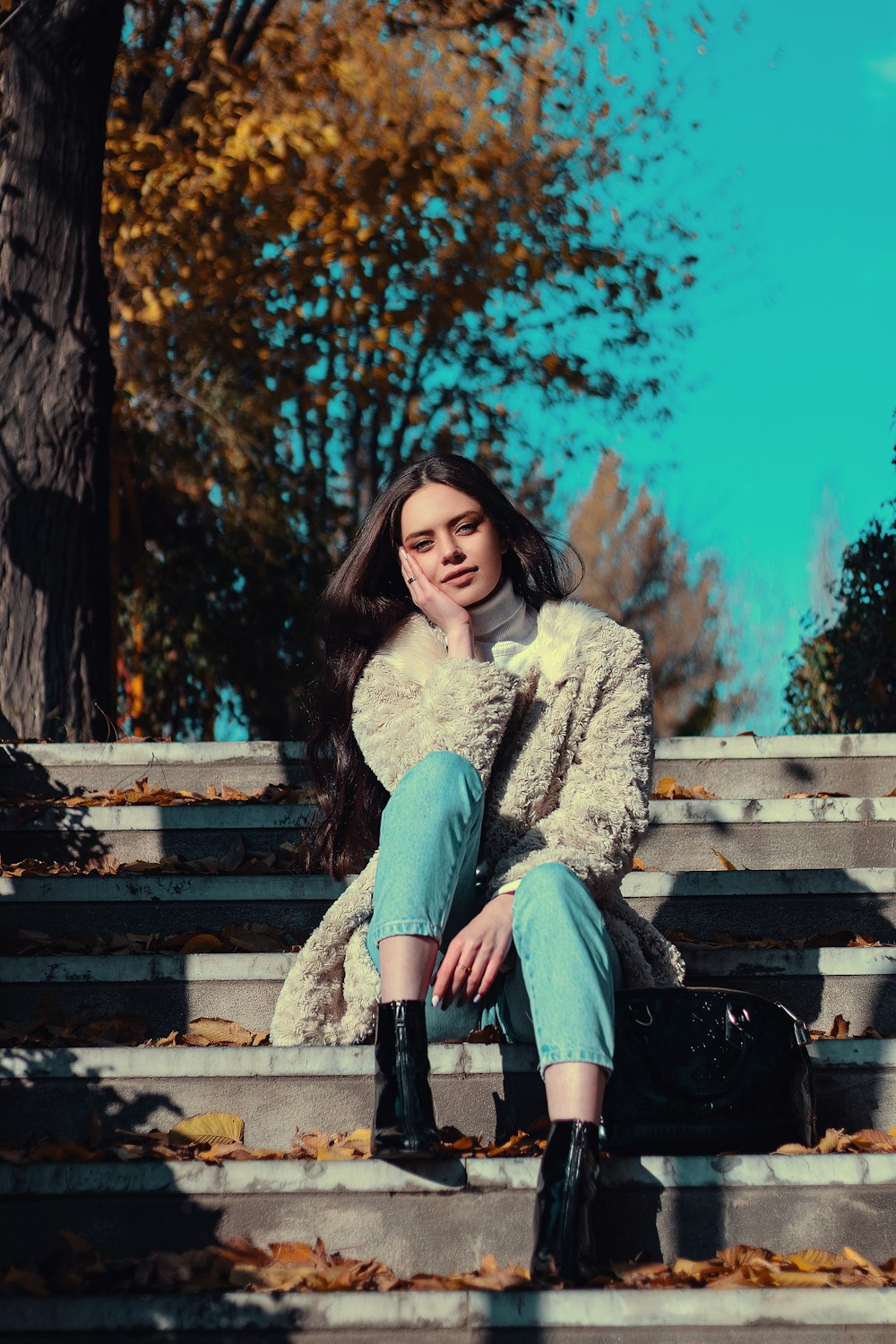 woman sitting on stairs