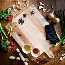 assorted spices on chopping board