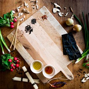 assorted spices on chopping board