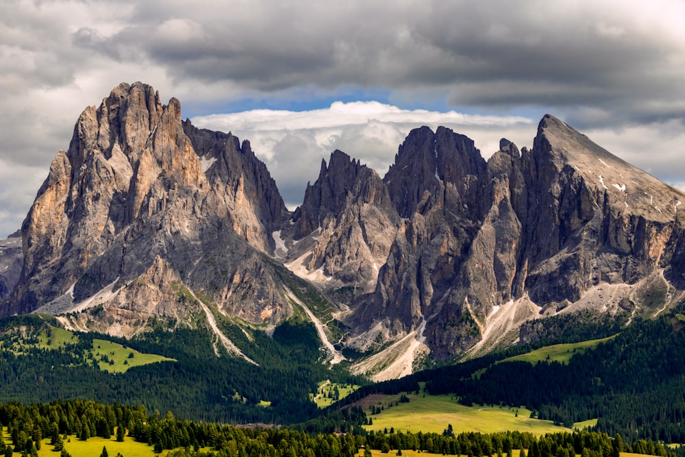 mountains under cloudy sky