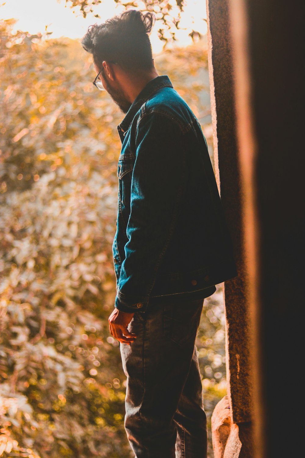 man wearing green jacket