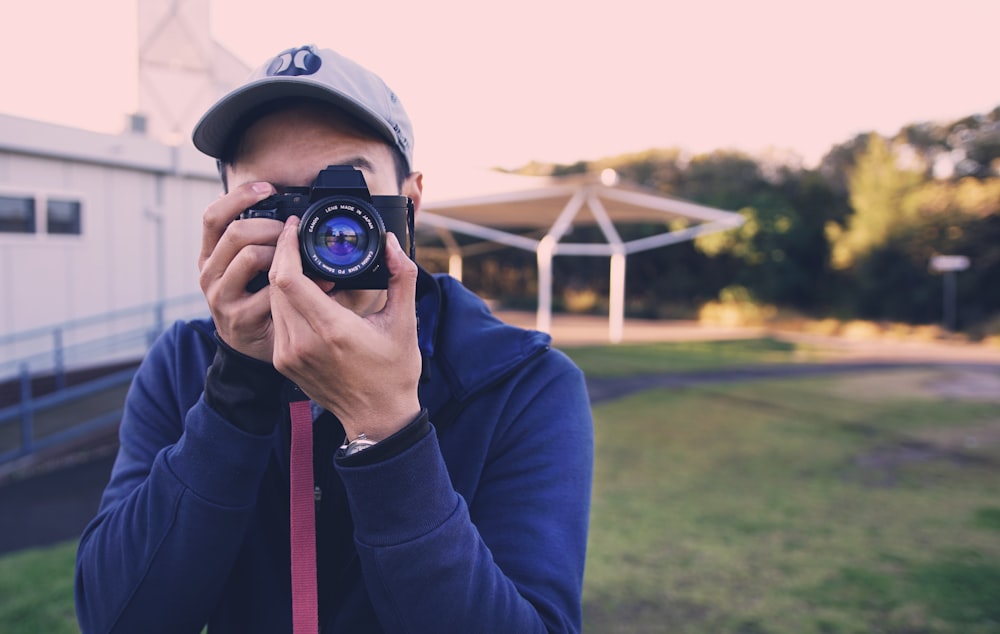 man using camera