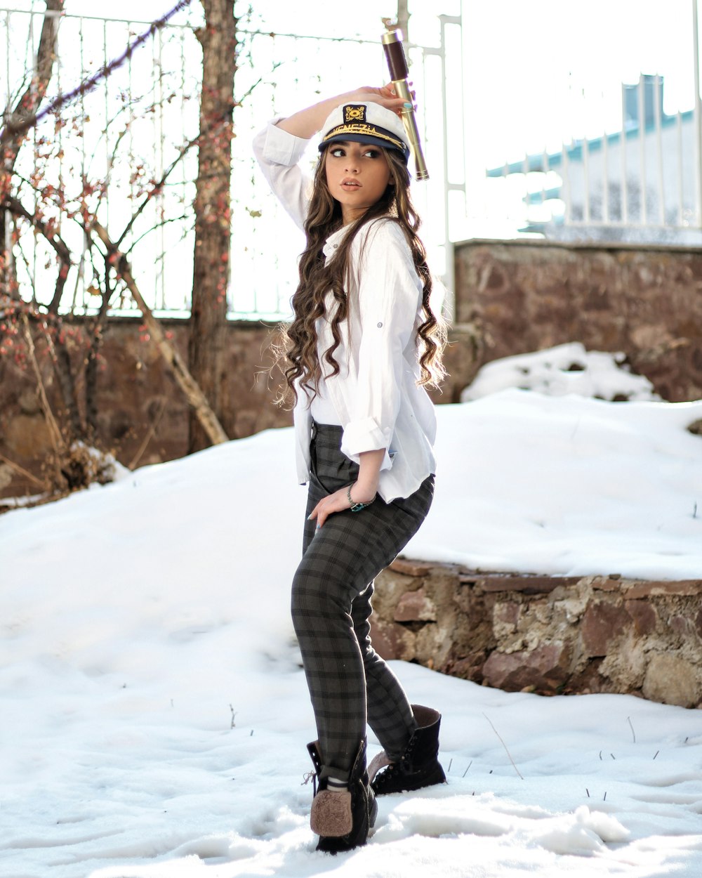 women's white long-sleeved blouse and gray plaid fitted pants