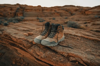 pair of brown leather boots