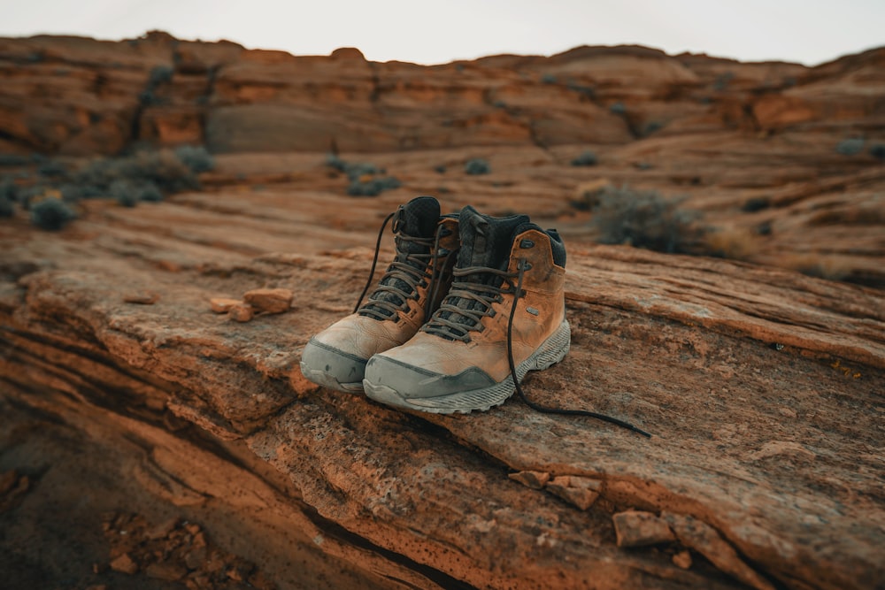 pair of brown leather boots