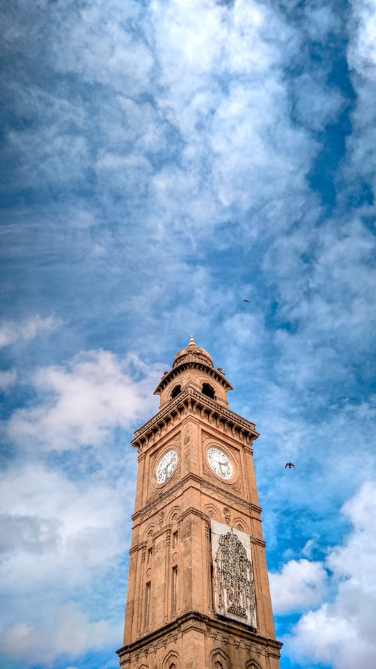 brown tower clock in Karnataka India