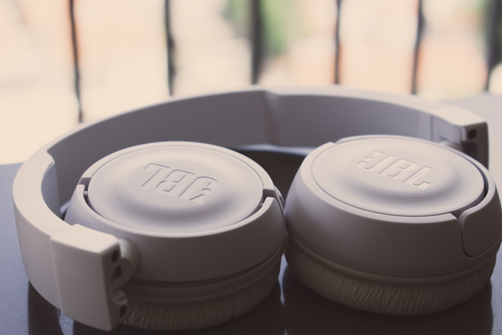 white JBL wireless headphones