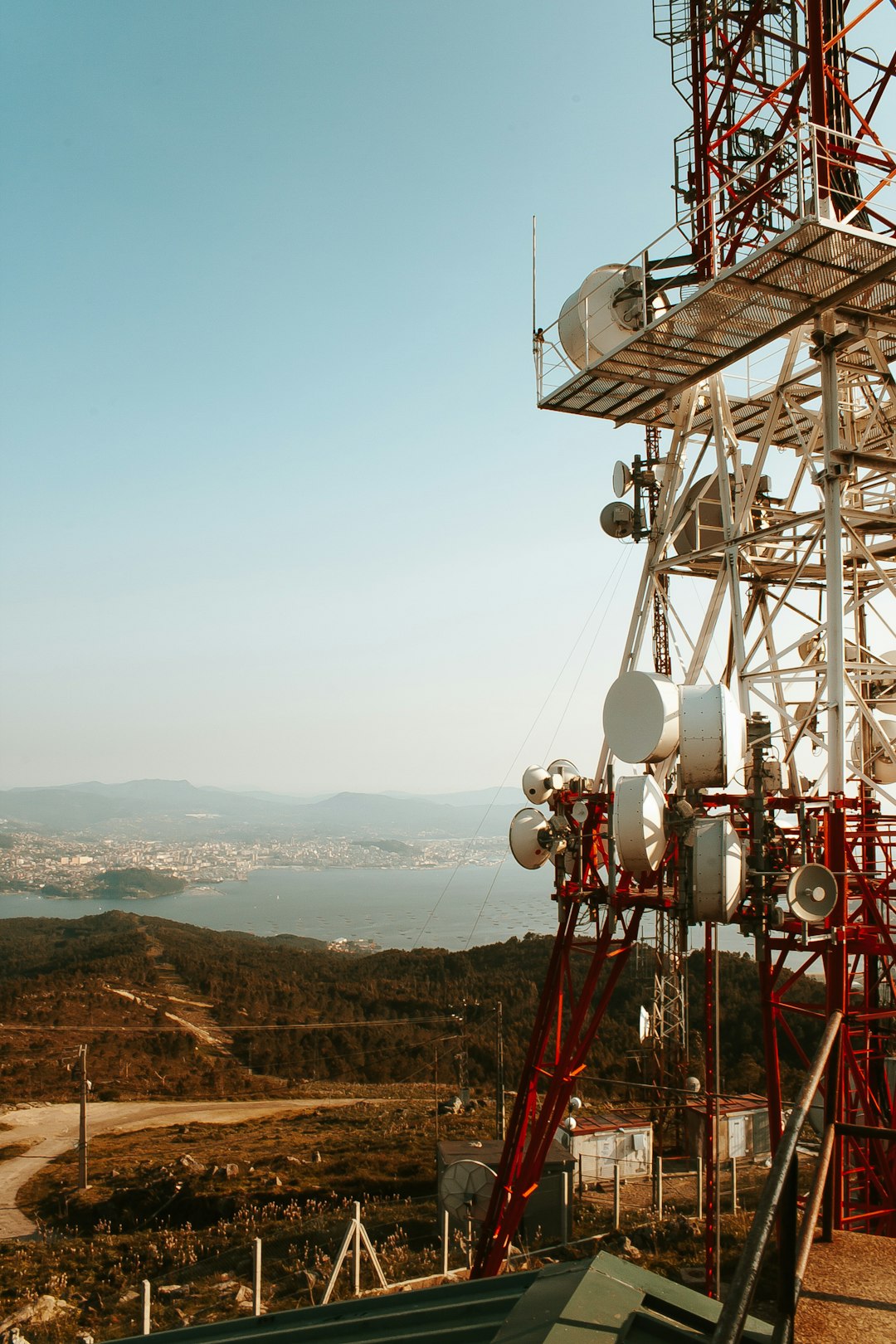 red and white metal tower