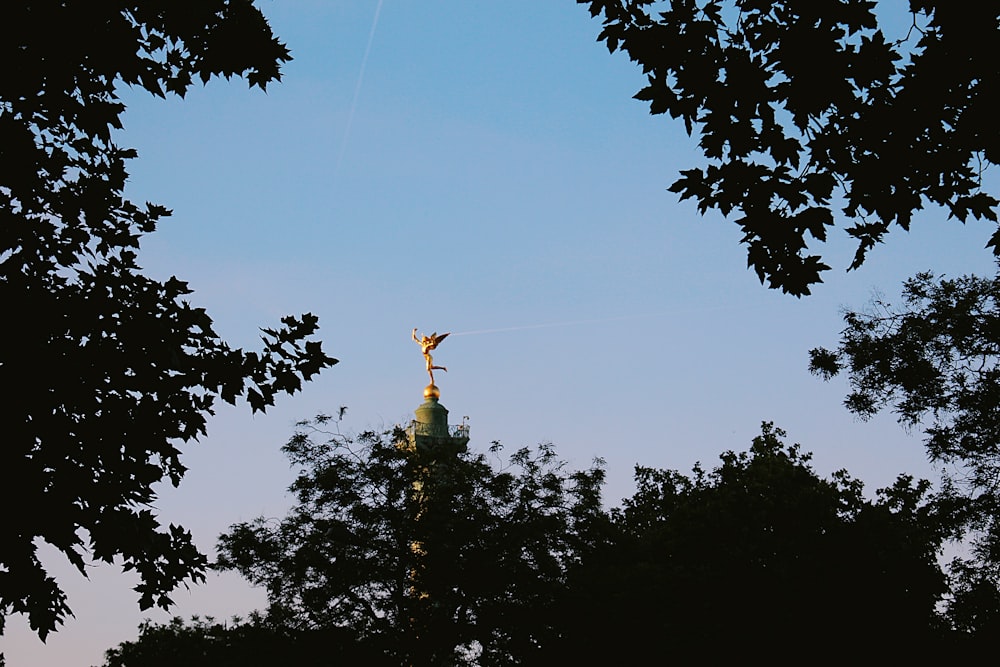 gold-colored angel statue