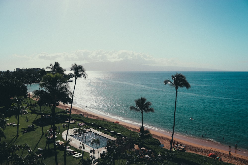 calm sea and shore near swimming pool