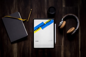 black tablet computer turned on displaying Plan Your Year application