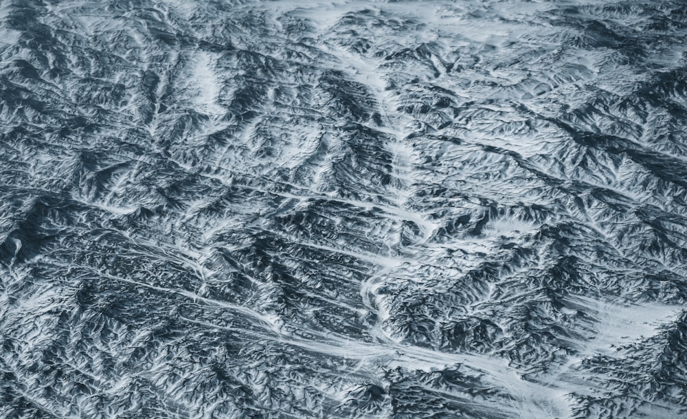 a view of a mountain range from an airplane