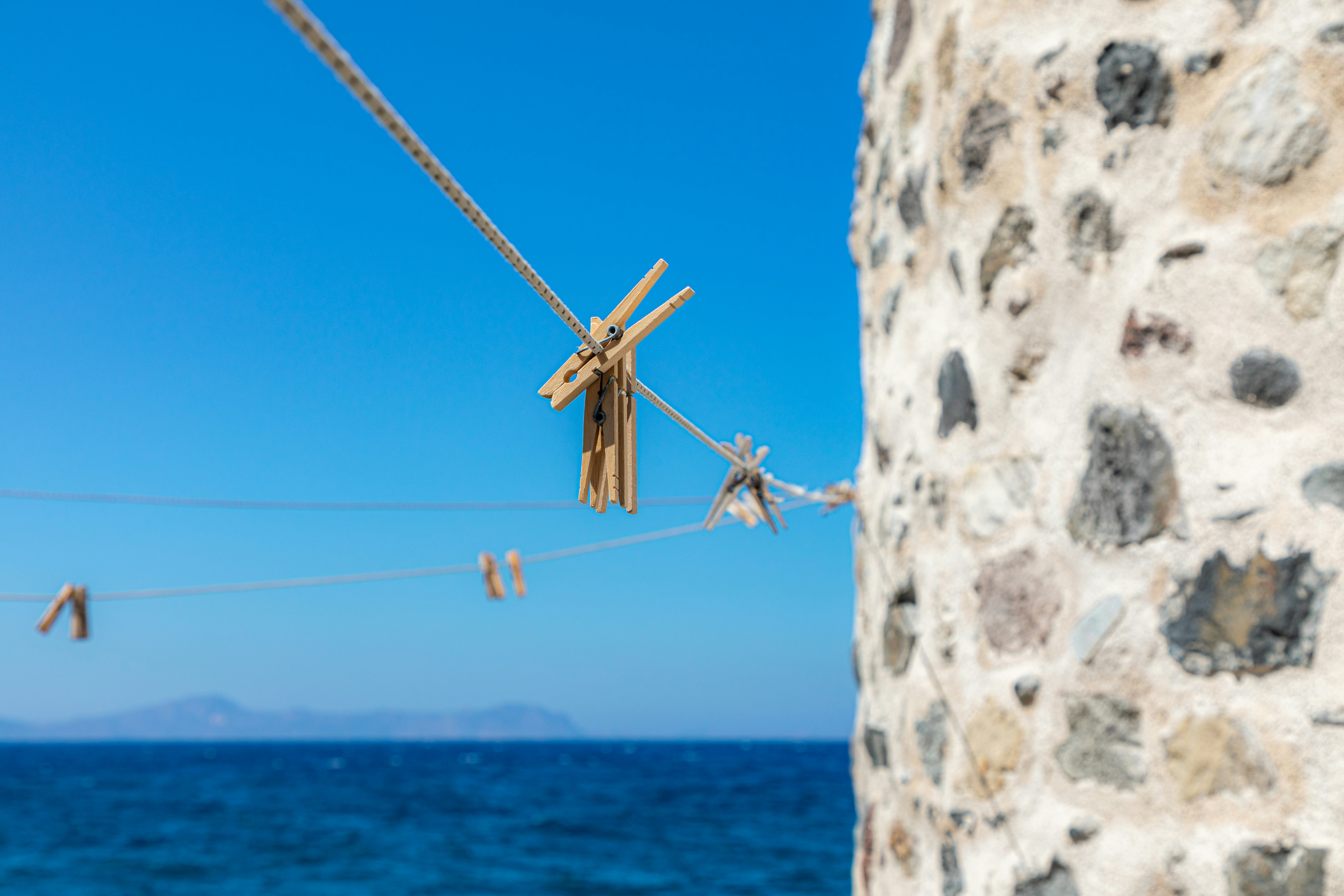 Clothespin on a rope near the sea.