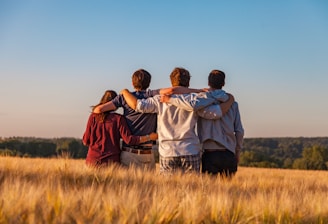 unknown persons standing outdoors