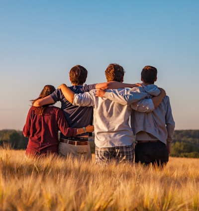 unknown persons standing outdoors