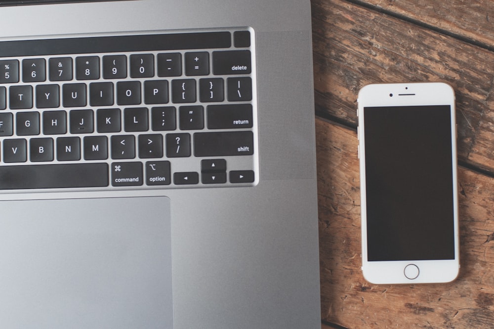 MacBook Pro beside iPhone photo – Free Grey Image on Unsplash