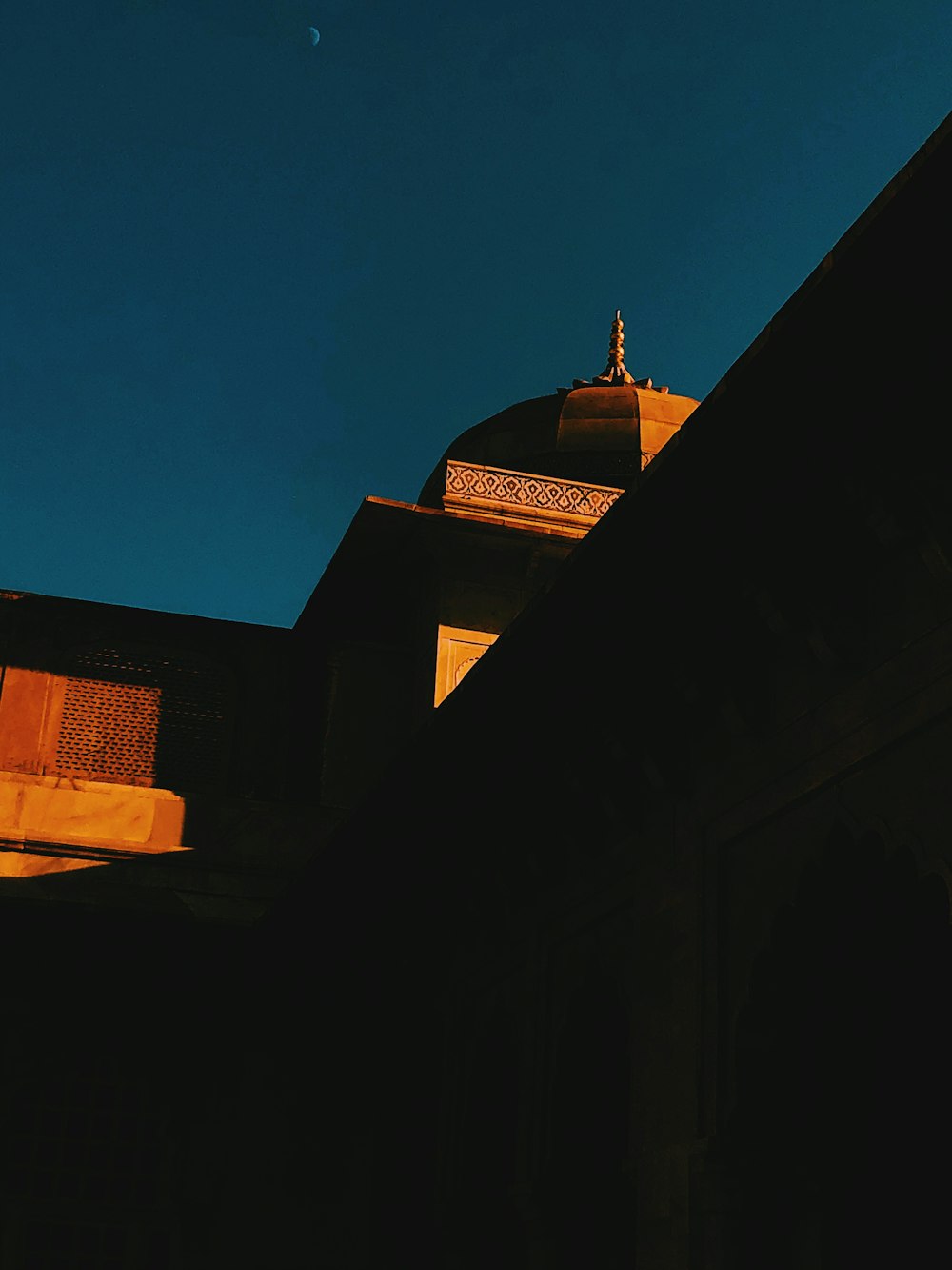 low-angle photography of brown concrete building