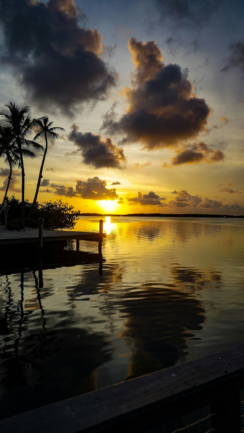 calm body of water under golden hour