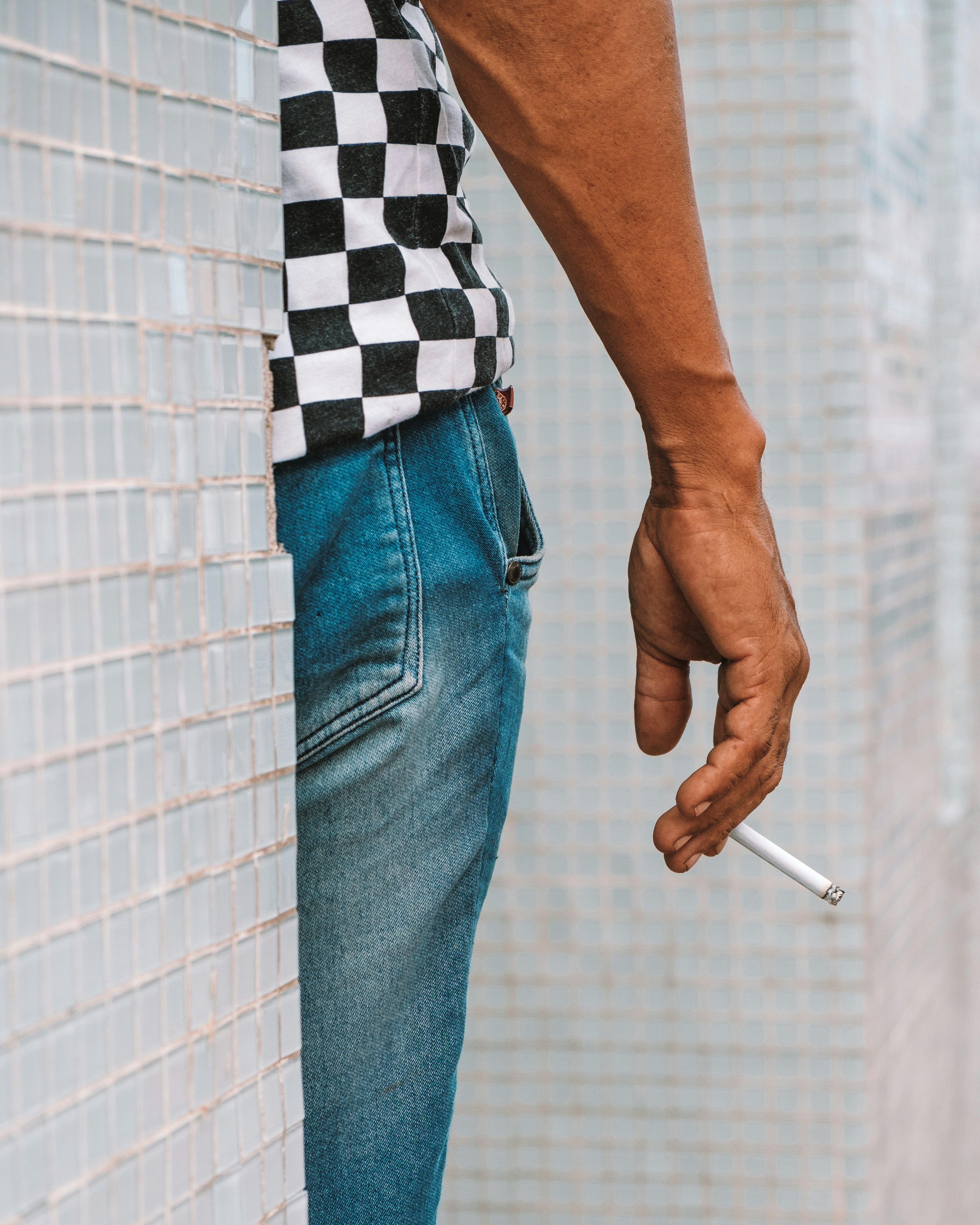 perso nwearing blue faded jeans