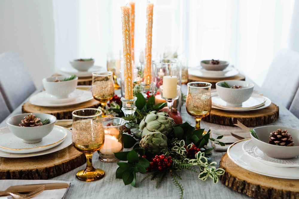 yellow taper candles on table