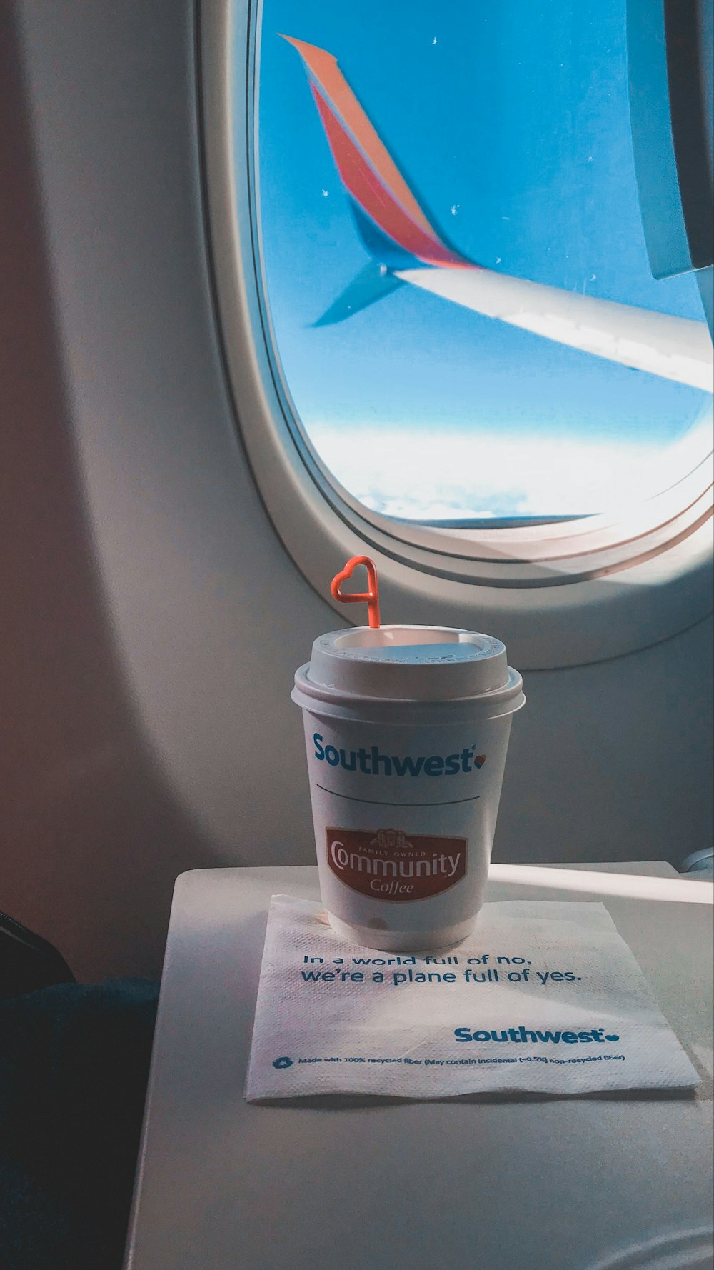 white cup in airliner