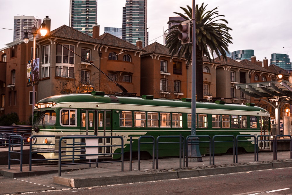 shallow focus photo of white and green train