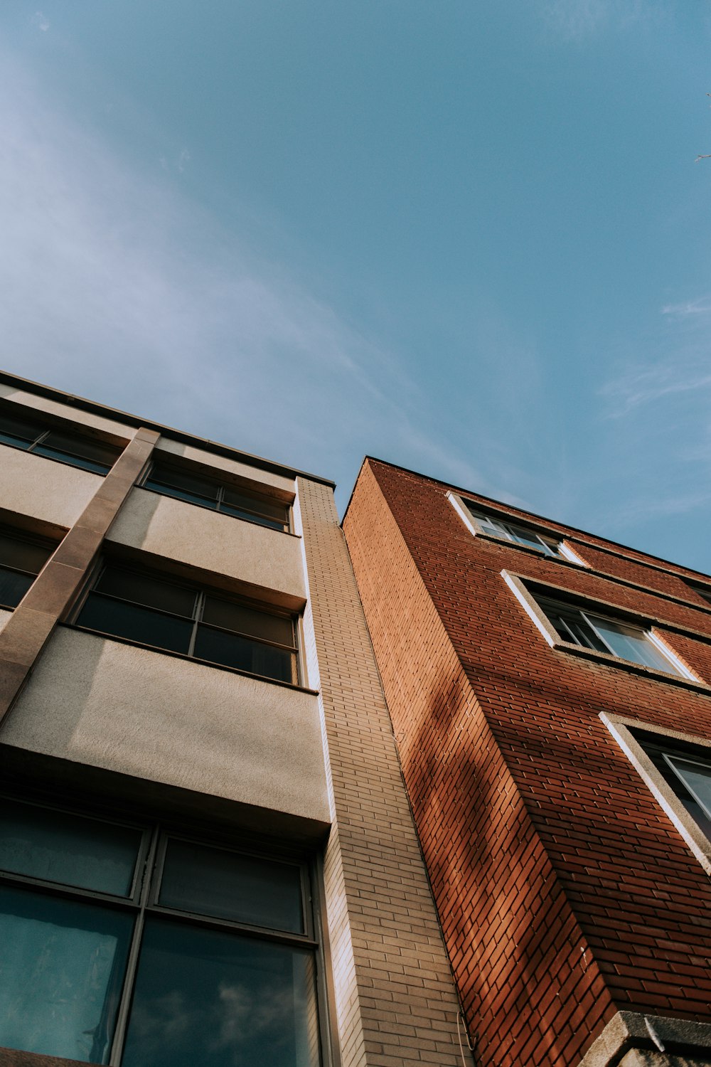 brown concrete buildings under blue sky