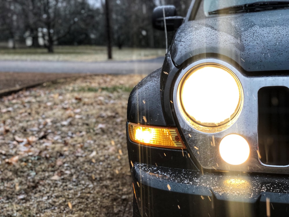 shallow focus photo of black car