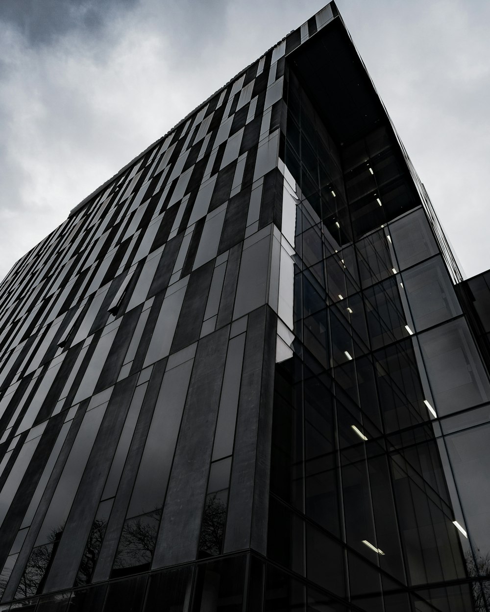 low-angle photography of curtain glass building