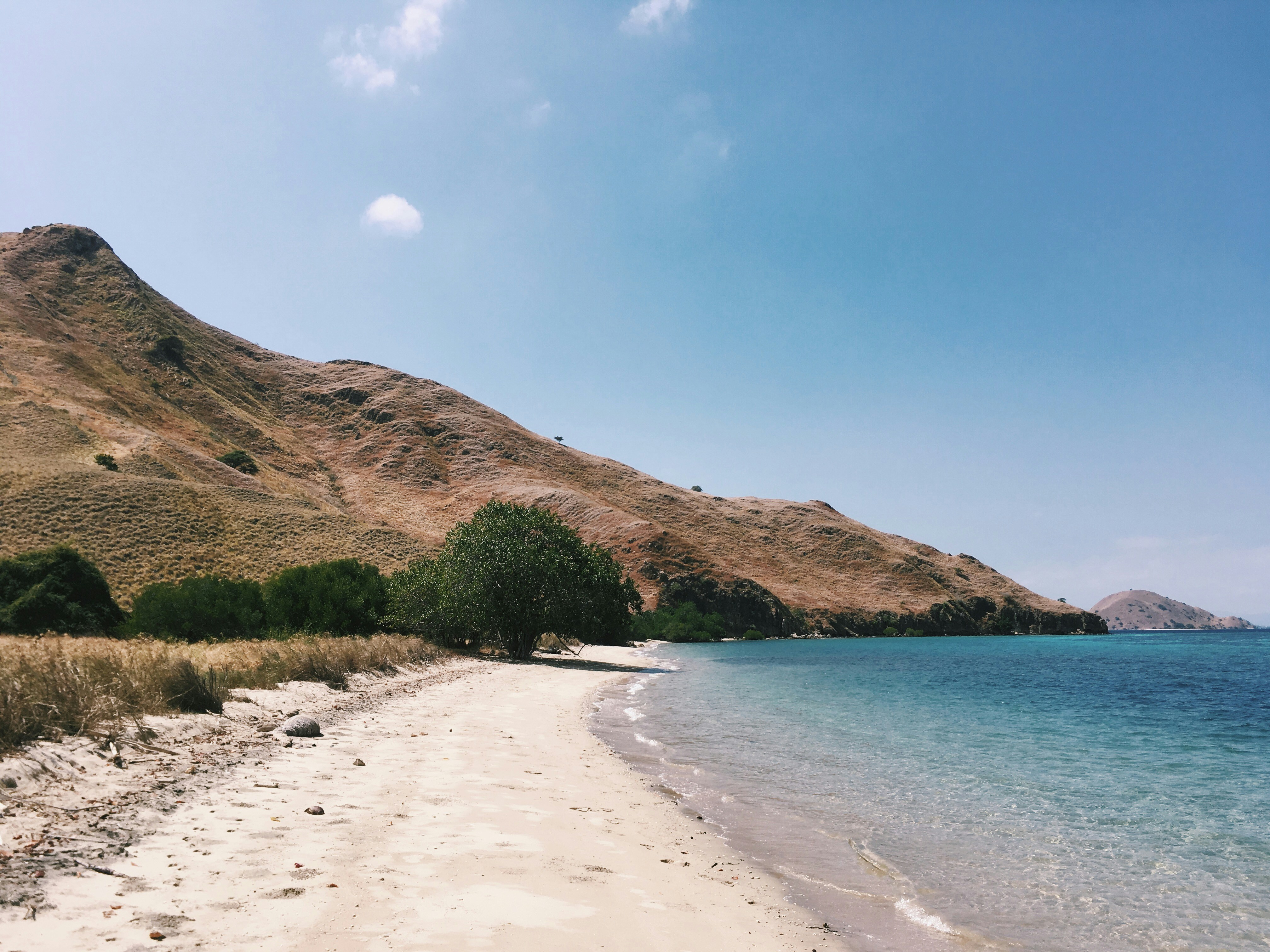 seashore and mountain scenery, Gili Lawa Darat Island shore, Flores.