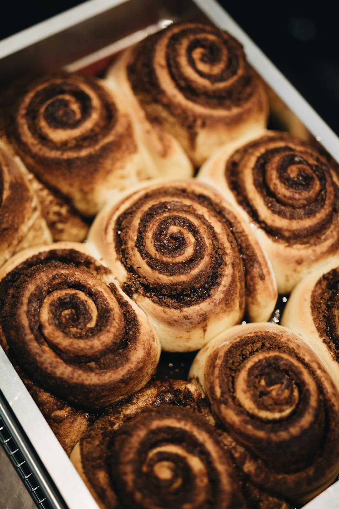 shallow focus photo of brown muffins