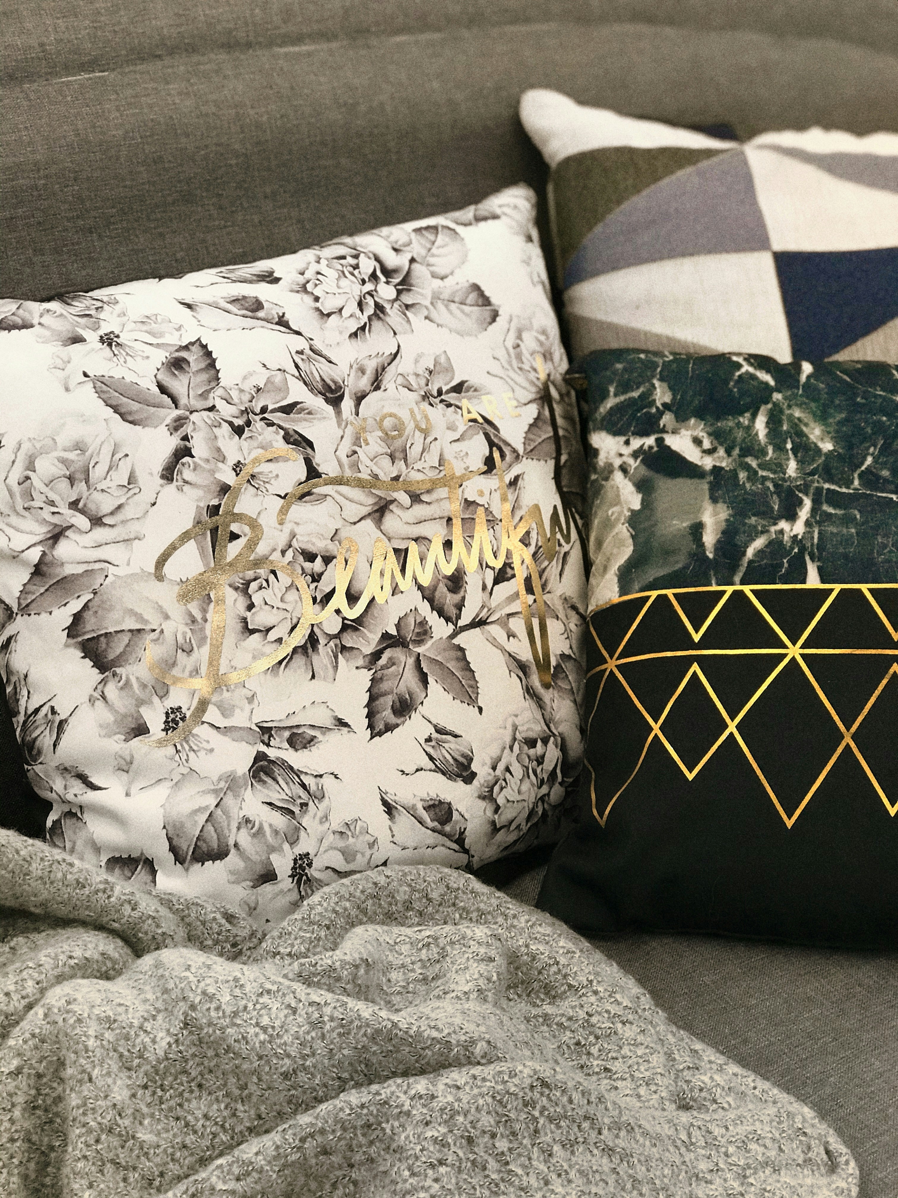 Soft decorative throw pillows with geometric patterns for couch and bed