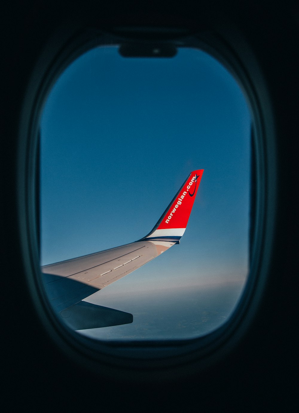 window photography of airliner