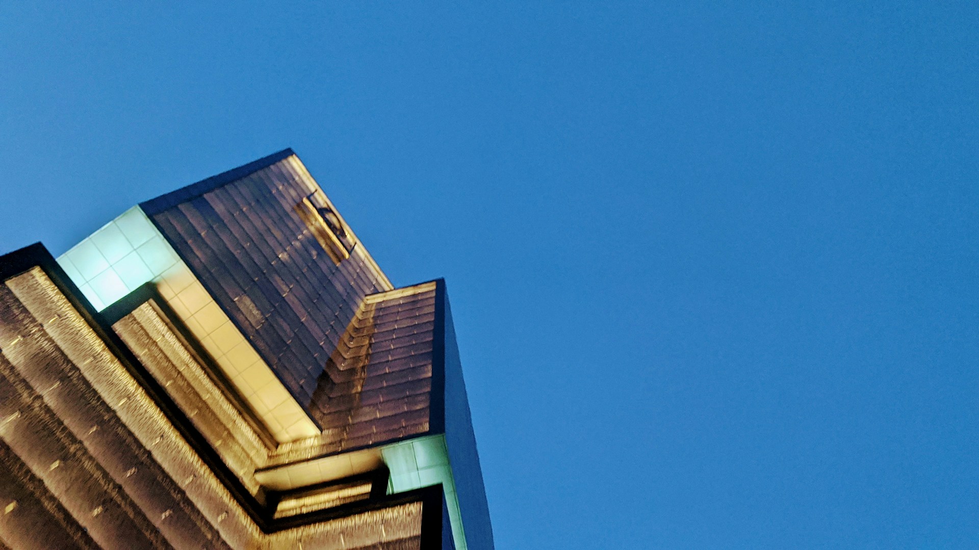 woman wearing yellow long-sleeved dress under white clouds and blue sky during daytime
