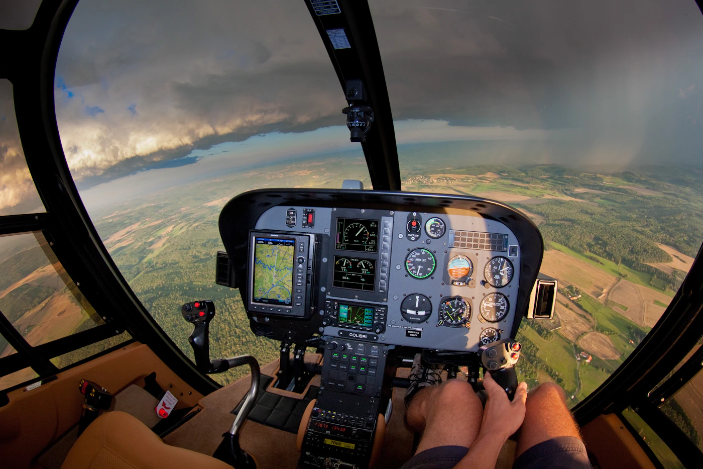 Workers riding as passengers inside a helicopter cabin during a transport flight